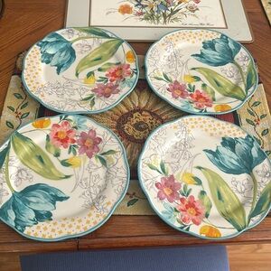 4 lovely  luncheon plates